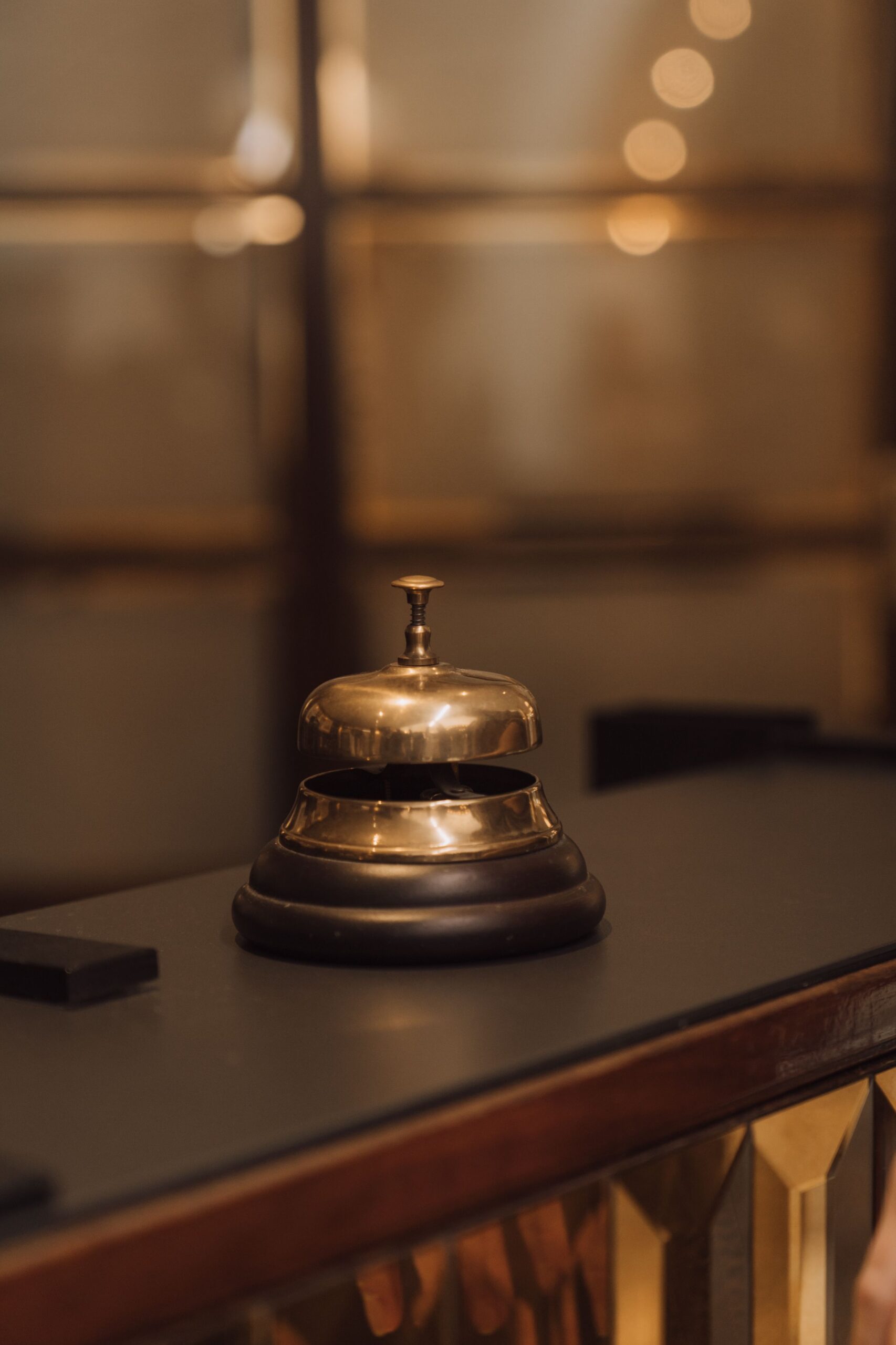 Hotel service bell at a reception desk